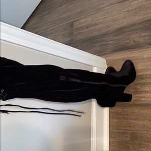 Thigh high heeled boots